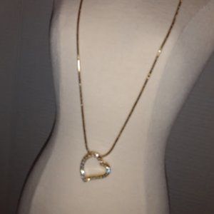 BMNY: silver tone Rhinestone heart pendant necklace.